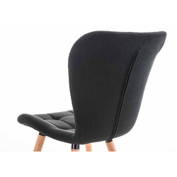 Elegant matstol med vadderad sits och träben