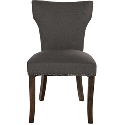 Elegant stoppad matstol med tidlös design och golvskydd