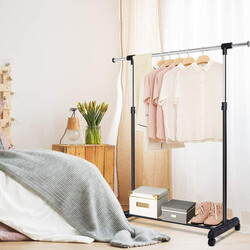 Höj- och sänkbar klädställning med hjul och förvaringshylla