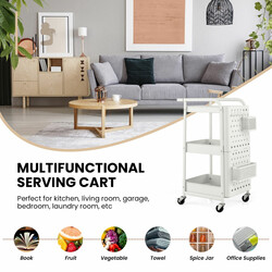 Vit 3-nivåers rullvagn i metall med avtagbara paneler, korgar och krokar