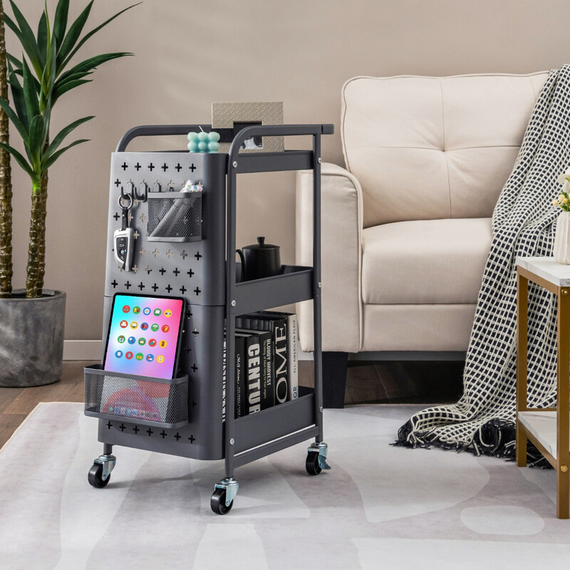 Grå 3-nivåers rullvagn med pegboards, korgar och krokar för flexibel förvaring