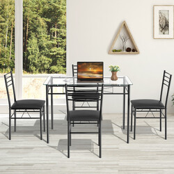 Matgrupp i 5 delar med glasbord och stoppade stolar i svart