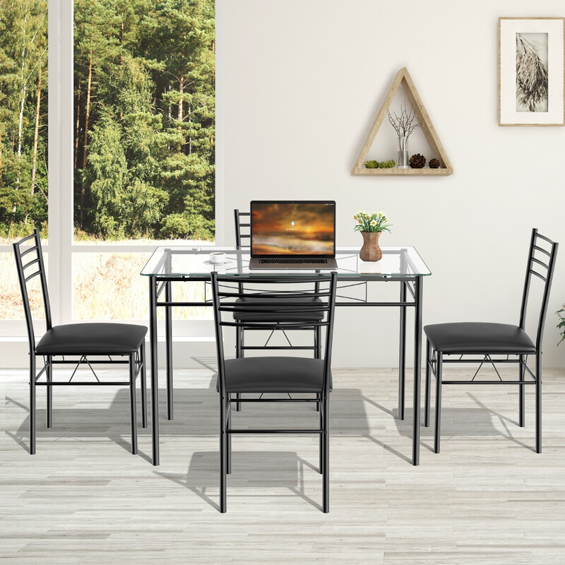 Matgrupp i 5 delar med glasbord och stoppade stolar i svart