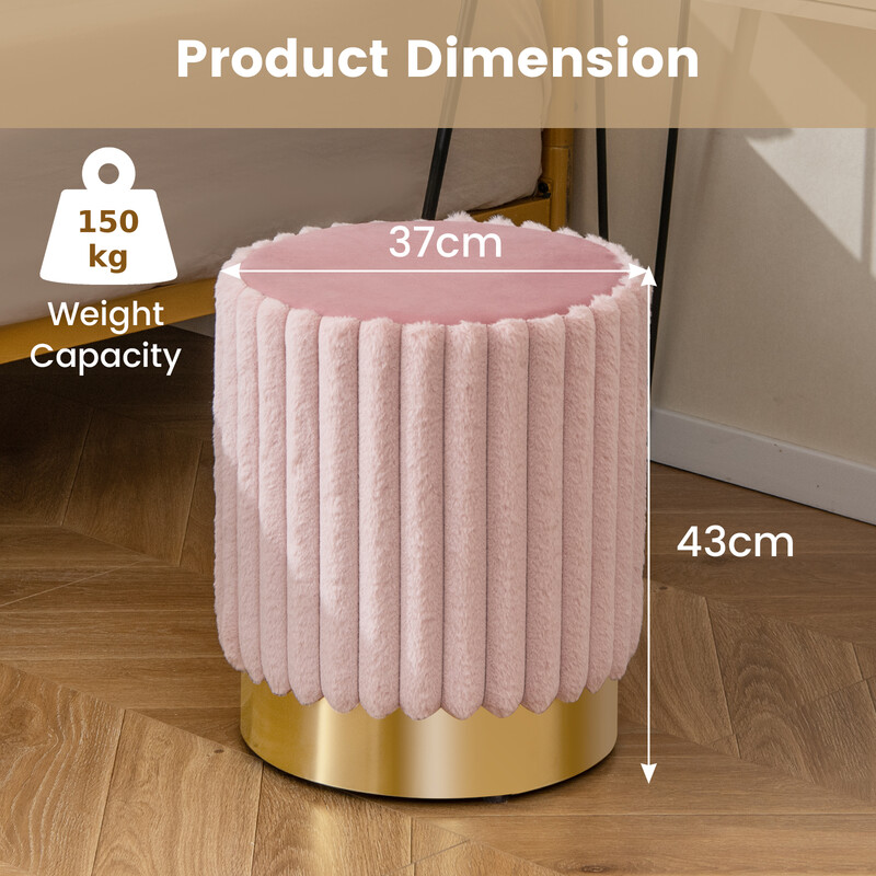 Rund rosa sammetspuff med stabil metallbas och mjuk stoppning