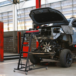 Hopfällbar arbetsbänk med justerbar höjd och vinkel för fordonsunderhåll och reparationer