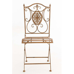 Fällbar järnstol med antikpatina och nostalgiska dekorationer