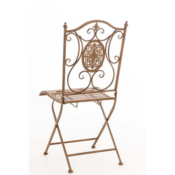 Fällbar järnstol med antikpatina och nostalgiska dekorationer