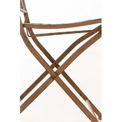 Fällbar järnstol med antikpatina och nostalgiska dekorationer